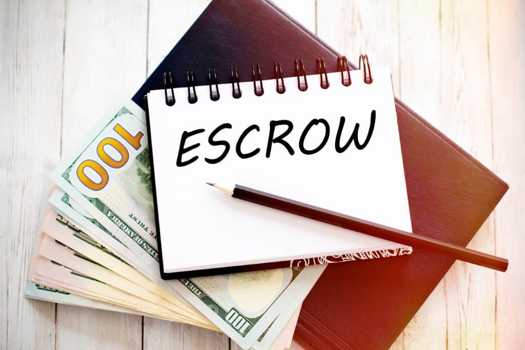 Escrow Name Written On Paper